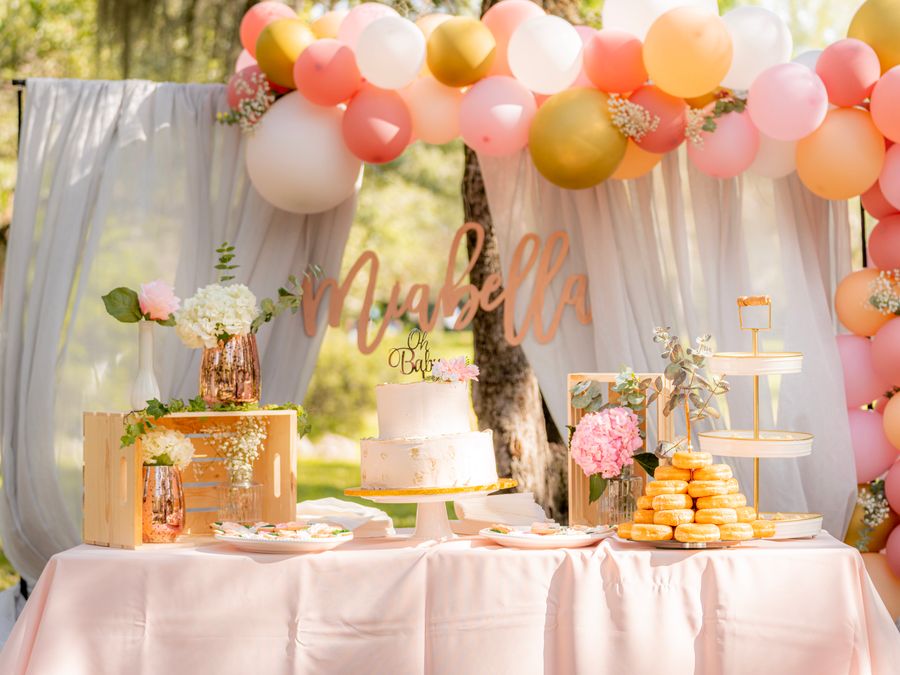 Pastel baby shower decorations with balloons